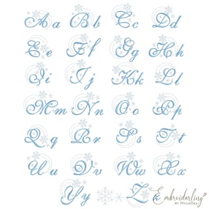 May include: A full alphabet in upper and lower case, presented in a graceful, cursive script in pale blue. Each letter is embellished with snowflake motifs and swirling lines. The image includes the text "Embroiderling by RivusDea."