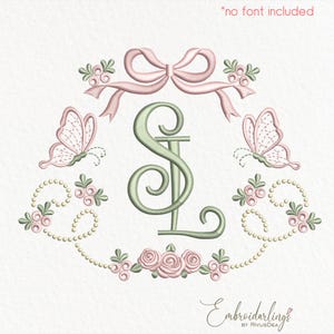 May include: An embroidered design featuring the letters "SL" in a soft green color, surrounded by pink butterflies, a bow, roses, and pearl-like accents. The text "* no font included" is at the top.