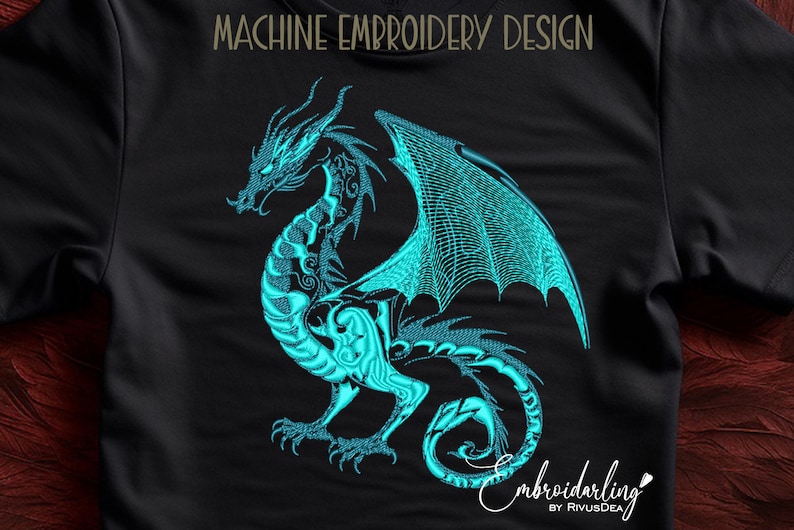 May include: Machine embroidery design of a teal blue dragon with wings spread out. The dragon is on a black background.