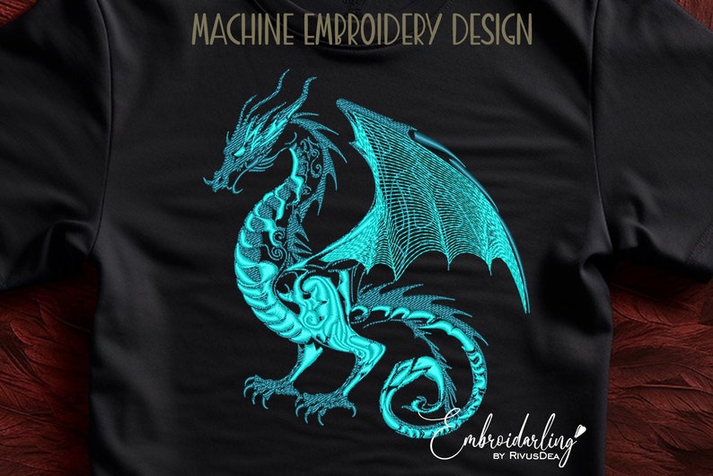 May include: Machine embroidery design of a teal blue dragon with wings spread out. The dragon is on a black background.
