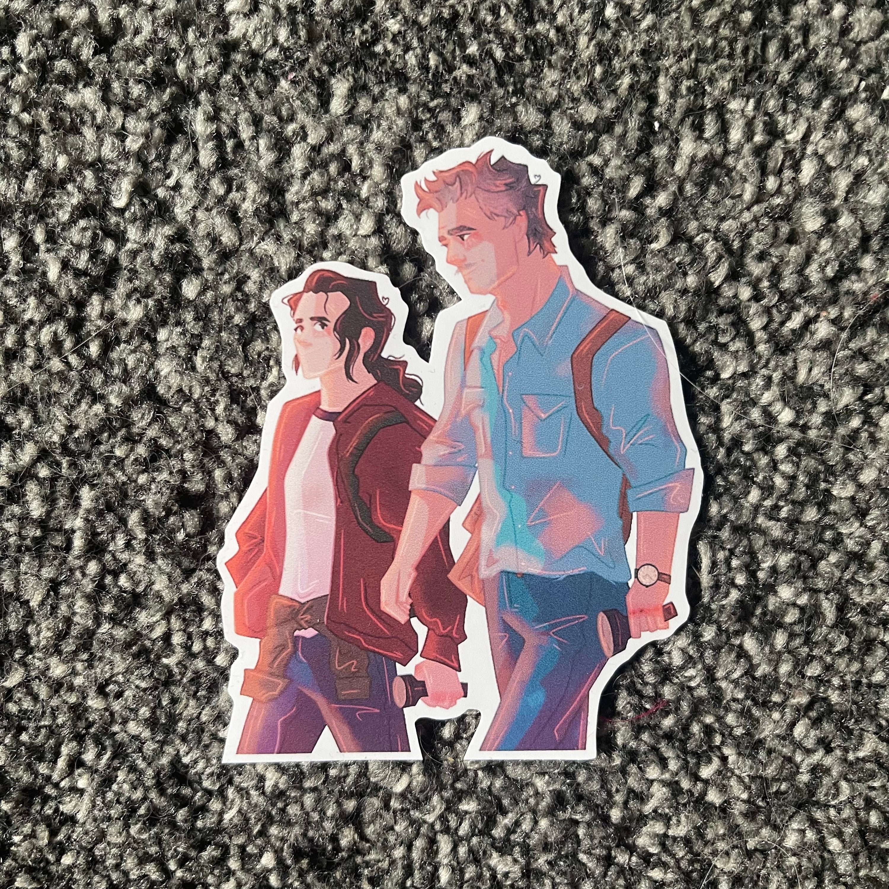 The Last of Us (PT. I) - Ellie and Joel cartoon/comic ver. (with TLOU  logo) Sticker for Sale by ShapedCube