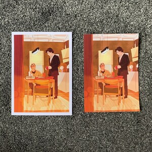 May include: Two men are sitting at a table in a room with brown walls and wooden floors. The men are wearing suits and are drinking from mugs. The room has a window with a view of a city skyline.