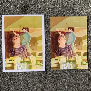 May include: Two people are sitting at a table, one is playing a violin and the other is smiling. The table is covered in a white tablecloth and there are glasses and plates on the table. The background is a light brown color.