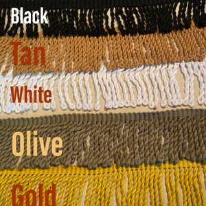 May include: Five different colors of twisted fringe trim. The colors are black, tan, white, olive, and gold.