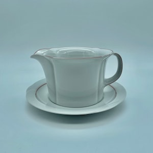 ARZBERG Jug and Saucer . white with pink border