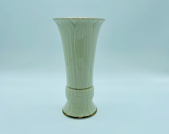 Vintage Japanese leaf vase in ivory with gold accents.