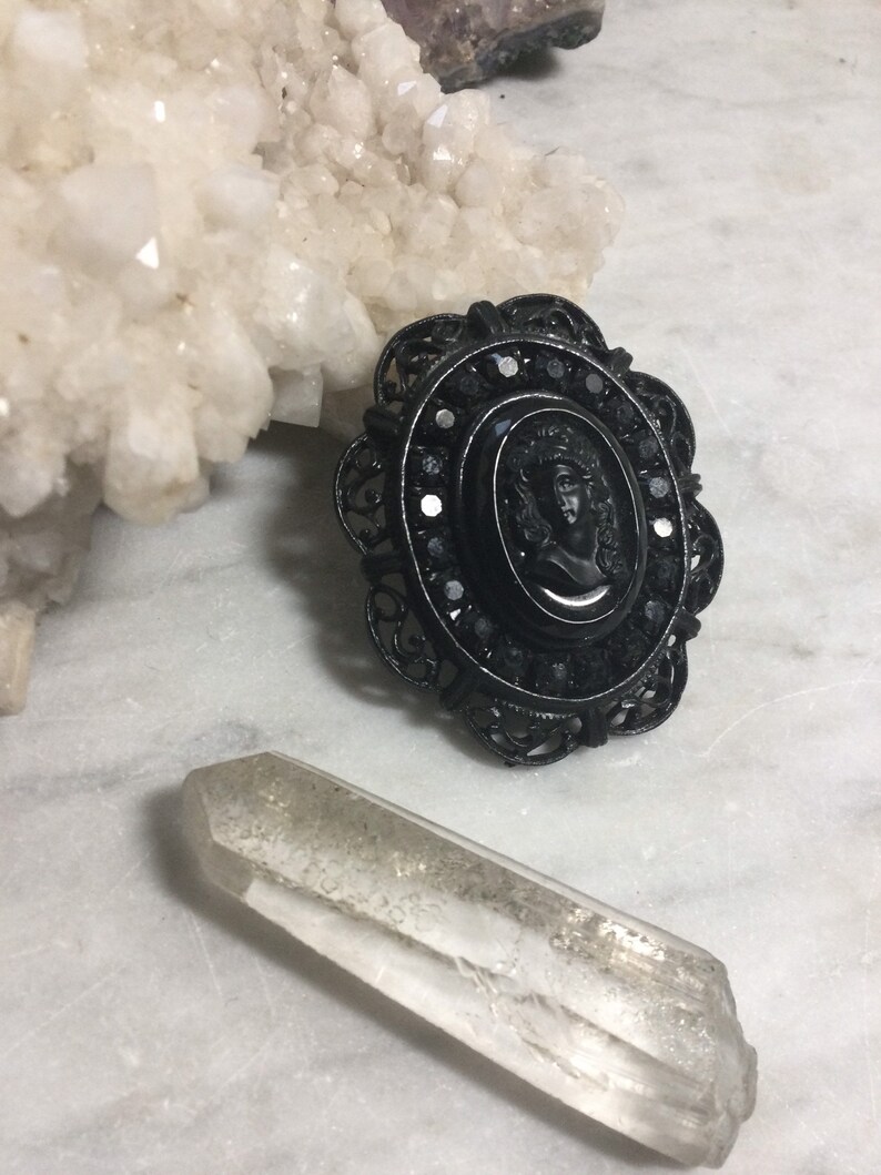 black glass and blackened steel 1980\u2019s Victorian Revival gothic black cameo brooch retro metal punk goth