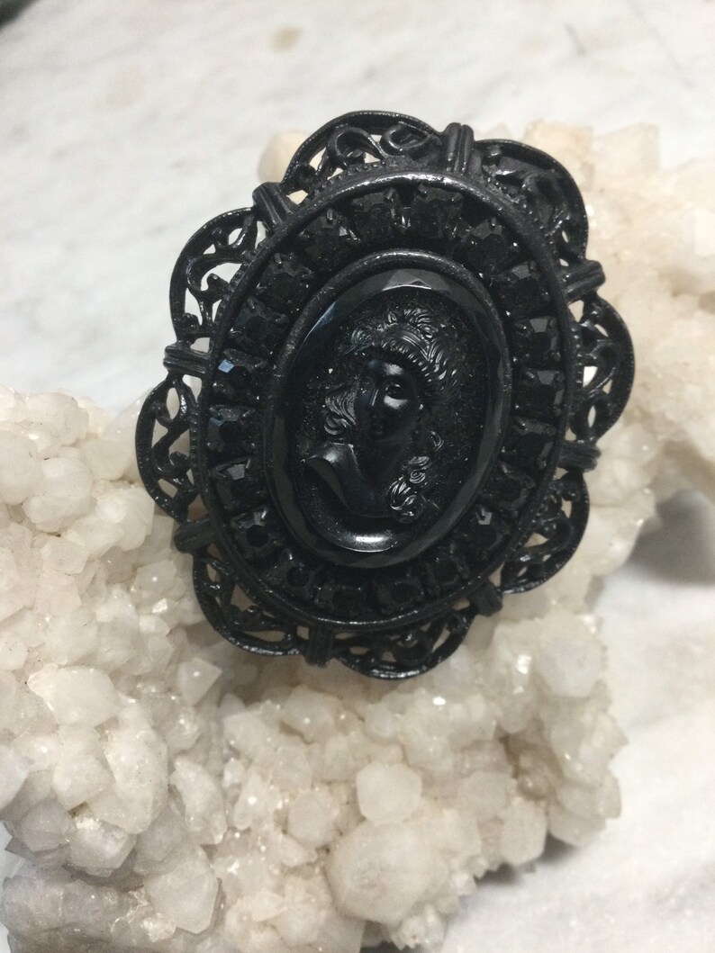 black glass and blackened steel 1980\u2019s Victorian Revival gothic black cameo brooch retro metal punk goth