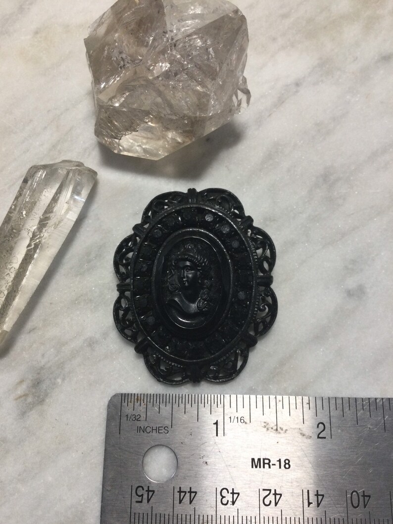 black glass and blackened steel 1980\u2019s Victorian Revival gothic black cameo brooch retro metal punk goth