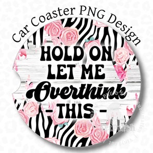 May include: Black and white zebra print car coaster with pink flowers and the text "Hold on let me overthink this".