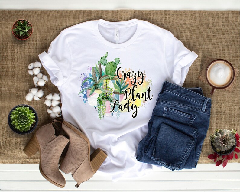 May include: White t-shirt with a watercolor design of potted plants and the text "Crazy Plant Lady".