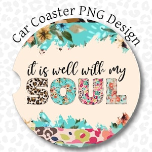 May include: A round car coaster with a peach background and a floral design. The text "it is well with my SOUL" is written in black with a floral and leopard print design.
