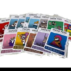 May include: A collection of NSFW playing cards with various illustrations and text. The cards feature cartoon animals in humorous situations, with phrases like "Ambush," "Expose," and "Sneak Peek." The cards are white with colorful graphics.