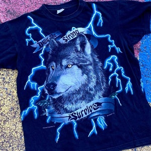 トップス AMERICAN THUNDER Blue Wolf vintage tee Vintage American Thunder Wolf Tee - XXL – Moby Thrift