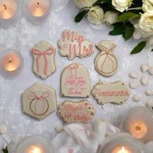 She&#39;s tying the knot sugar cookies Bridal shower cookies Tying the knot theme Bridal shower favors