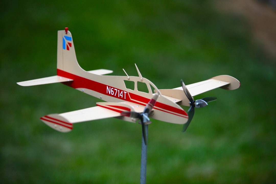 this-is-a-cessna-310-twin-engine-airplane-whirligig-weather-vane-the