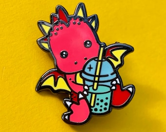 May include: A red cartoon dragon with yellow wings holding a blue and green boba tea with a yellow straw. The dragon has black eyes and a black outline.