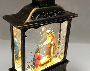Christmas Nativity Water Lantern: LED Swirling Glitter Holly Scene