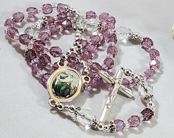 Luke the Apostle-Doctor Rosary with 6mm Garnet Color Fire Polished Beads Gift Boxed Silver Finish St Luke the Apostle-Doctor Center and 1 3/8 x 3/4 inch Crucifix St Luke the Apostle-Doctor Rosary with 6mm Garnet Color Fire Polished Beads Gift Boxed Silver Finish St Luke the Apostle-Doctor Center and 1 3/8 x 3/4 inch Crucifix St