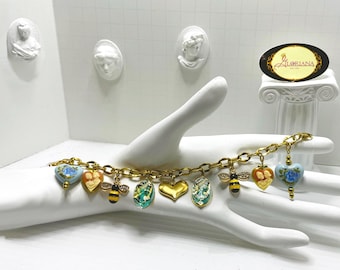 Bridgerton inspired jewelry, Stylish jewelry, Charm bracelet, Cameo, Lady whistledown, Bridgerton, charms, heart charms, hearts, bee charms
