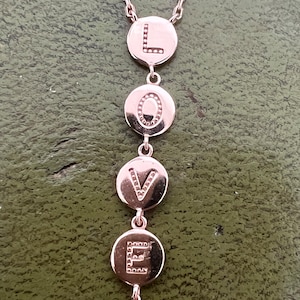 lovely silver gilt love pendant