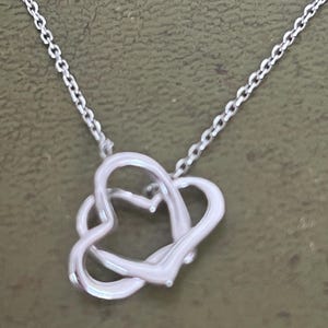 solid silver double heart pendant