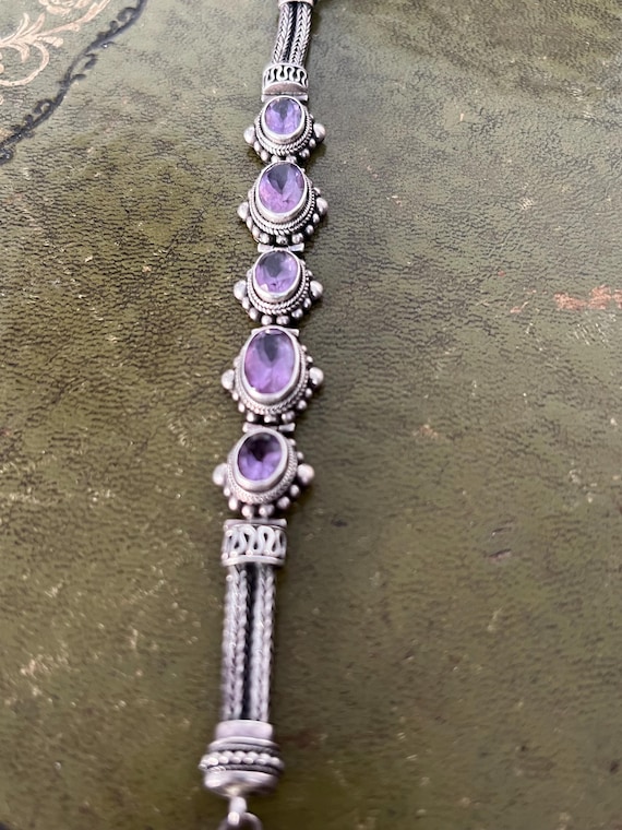 A solid silver amethyst bracelet - image 1