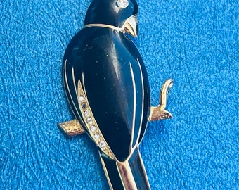 Metal and enamel bird brooch