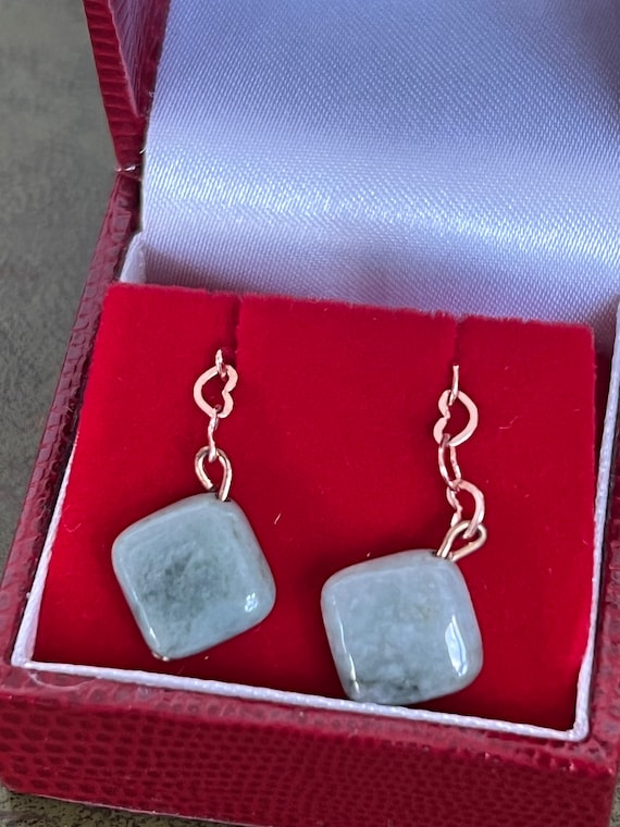 Striking jade and silver gilt dangle earrings