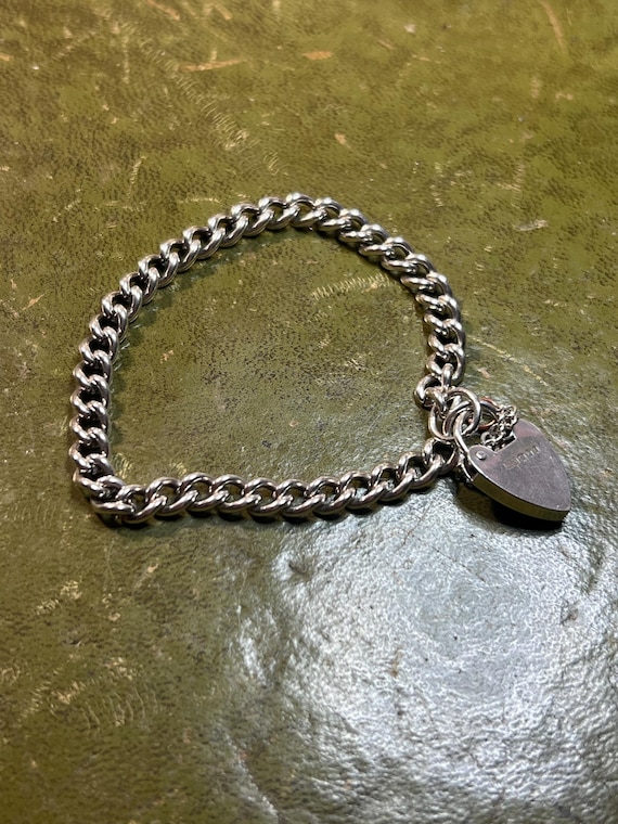 Stunning solid silver charm bracelet - image 1