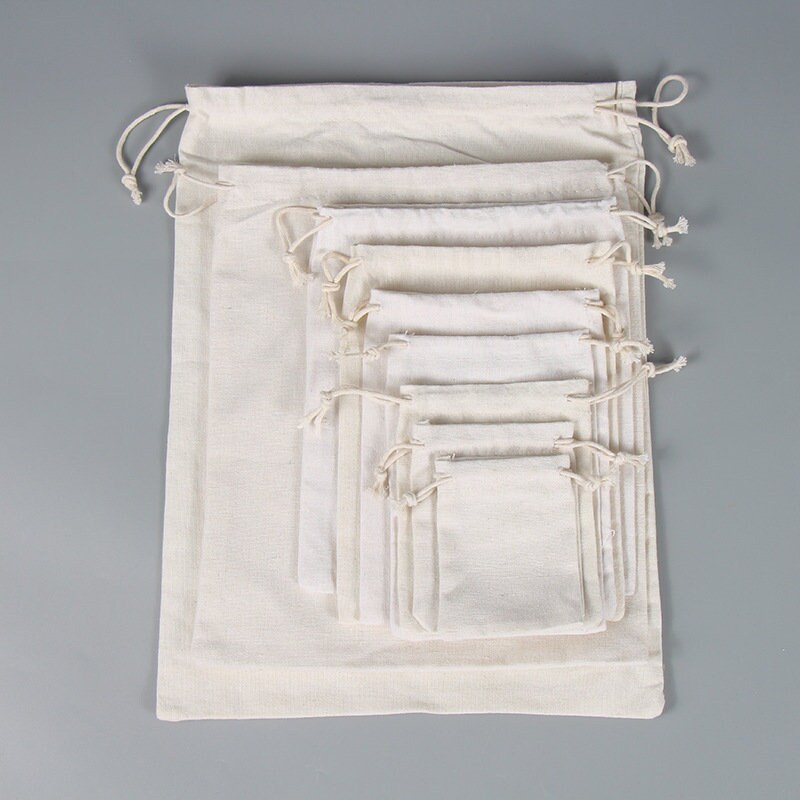 パーソナライズされたコットン巾着ギフトバッグ：カスタムロゴ