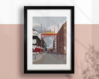 May include: A framed art print depicting a street scene with a red archway reading "The Barras". Buildings, including "Bill's Tool Store", line the street. The artwork is in a black frame and hangs on a pink and white wall.