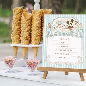 May include: A blue and white sign featuring a cartoon Mickey Mouse holding an ice cream cone. The sign reads "Main Street Ice Cream Parlor" and lists the following ice cream flavours: Chocolate, Vanilla, Strawberry, Cookies and Cream, Mint Chocolate Chip, and Cookie Dough.