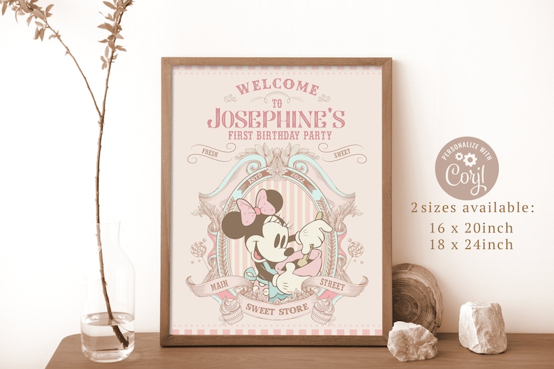 May include: A printable party sign featuring a cartoon image of Minnie Mouse baking in a pink and white kitchen. The sign says "Welcome to Josephine's First Birthday Party".