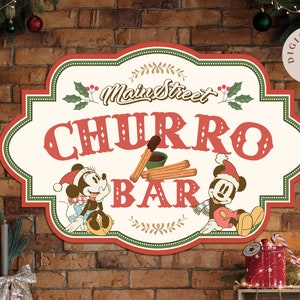 May include: A vintage-style sign with a red and white background featuring the text "Main Street Churro Bar". Mickey Mouse and Minnie Mouse are depicted in Christmas attire on either side of the sign. The sign is decorated with holly and greenery.