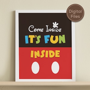 May include: A framed print with a white border. The top half is dark brown with the words "Come Inside" and "It's Fun" in white and blue, yellow, and green. The bottom half is red with the word "Inside" and two white circles. A brown circle in the corner says "Digital Files".