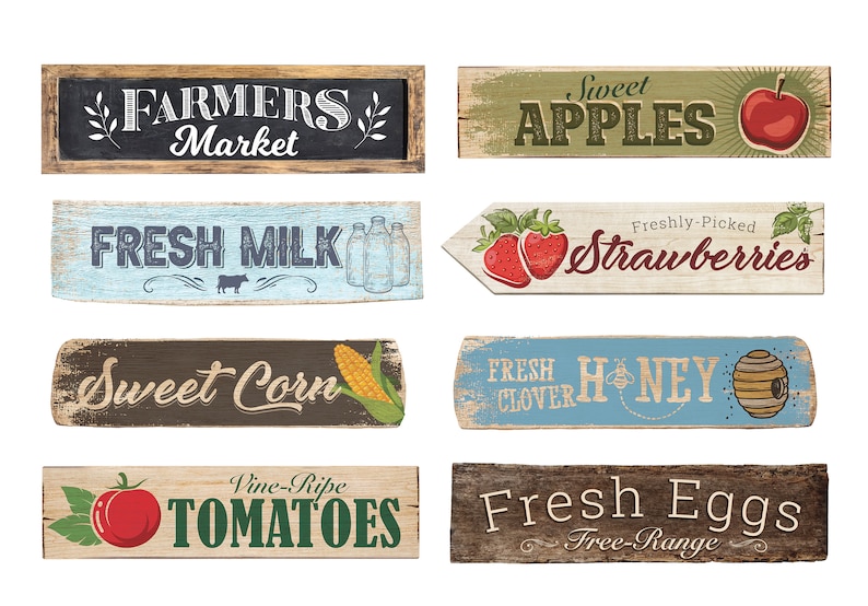 May include: Eight rustic wooden signs with various farm-fresh produce themes. The signs feature text like "Farmers Market", "Fresh Milk", "Sweet Corn", "Sweet Apples", "Freshly-Picked Strawberries", "Fresh Clover Honey", "Vine-Ripe Tomatoes", and "Fresh Eggs Free-Range".