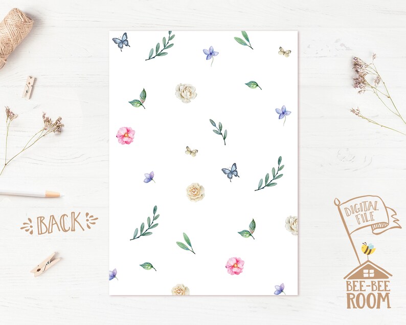 May include: A white background with a repeating pattern of watercolor flowers, leaves, and butterflies. The flowers are pink, white, and light blue. The butterflies are blue. The leaves are green.