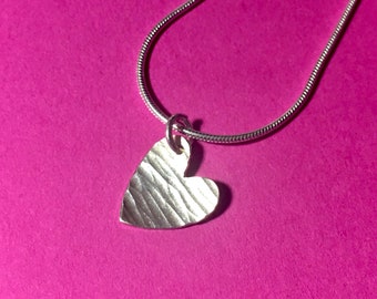 Tiny hammered heart pendant