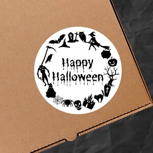 May include: A white round sticker with black Halloween themed illustrations and the text "Happy Halloween" in a dripping font.