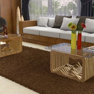 May include: Two wooden coffee tables with glass tops and a wavy design. The tables are on a brown shag rug in a living room setting.
