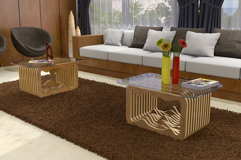 May include: Two wooden coffee tables with glass tops and a wavy design. The tables are on a brown shag rug in a living room setting.