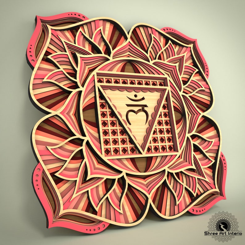 May include: A layered wooden wall art piece featuring a geometric design with shades of pink, red, and beige. The artwork has a central triangle with a symbol and is surrounded by a floral-like pattern. The piece is likely for home decor.