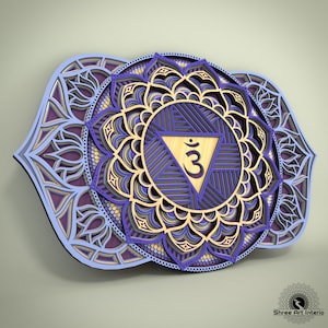 May include: A layered wooden wall art piece featuring a detailed mandala design. The artwork showcases concentric circles and intricate patterns in shades of purple, blue, and gold. A central triangle contains a symbol. The piece is designed to be mounted on a wall.
