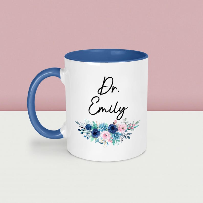 May include: A set of three ceramic mugs with a speckled, matte finish. The mugs are in shades of cream, light gray, and dark gray. Each mug has a simple, minimalist design, perfect for coffee or tea.
