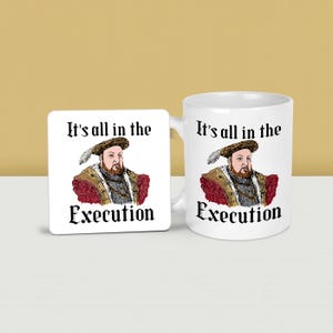 May include: A white ceramic mug and coaster set featuring a portrait of a historical figure. The mug and coaster both display the text "It's all in the Execution" in black, with the image of a man in a hat.