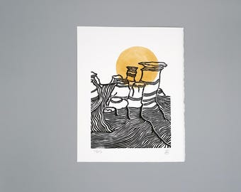 Original Drumheller hoodoos in the Badlands block print with ochre watercolour detail, hand printed