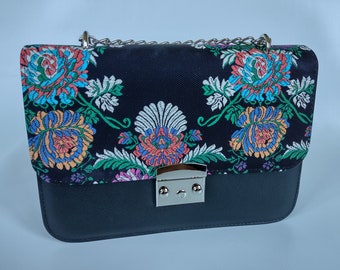 Official everyday woman's bag with floral motives