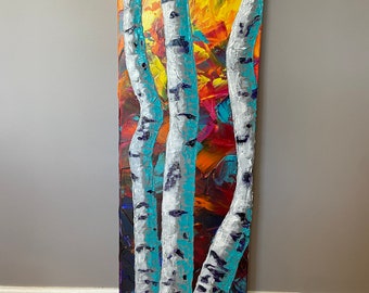 Rainbow Forest 1 is an abstract, acrylic, impasto birch trees painting on a 12x36 gallery wrapped canvas.
