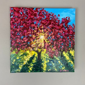 Let It Shine is a vibrant and colorful, acrylic, impasto cherry blossoms painting on a 12x12 professional, gallery wrapped canvas.